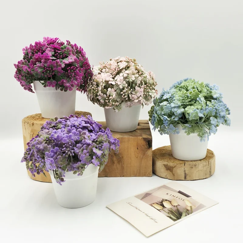 Mini pot de marguerites artificielles 15 cm