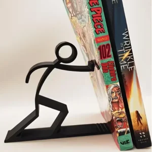 Serre-livres bonhomme qui pousse les livres Serre-livres bonhomme qui pousse les livres