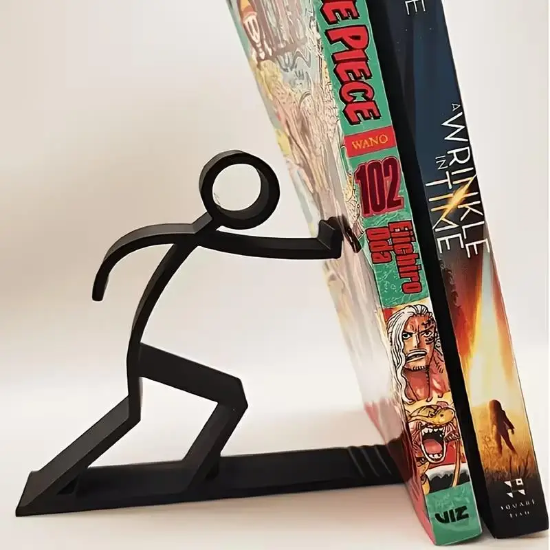 Serre-livres bonhomme qui pousse les livres Serre-livres bonhomme qui pousse les livres